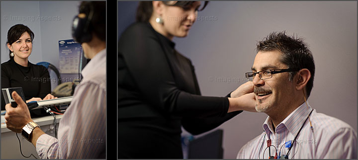 An audiologist tests and fits a hearing aid at Hearservice in East Melbourne.